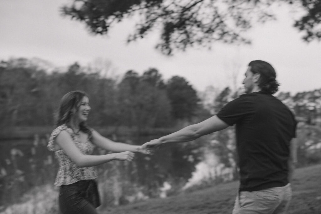 Motion blur of couple dancing and spinning in circles.