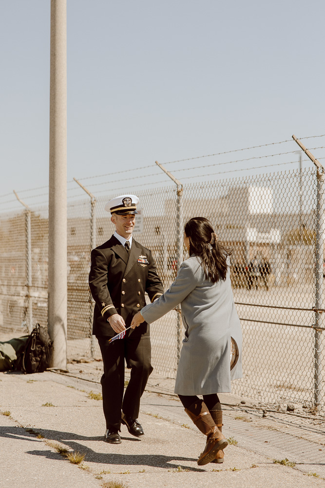 Navy sailor and his spouse reunite after a long deployment.